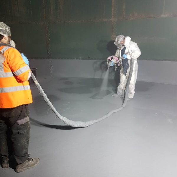 Sealing a leaking concrete tank base Polyurea spray applied