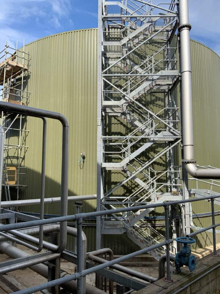 A glass fused to steel effluent tank in Buckinghamshire was experiencing significant leakage due to corrosion and perforations within the gas space