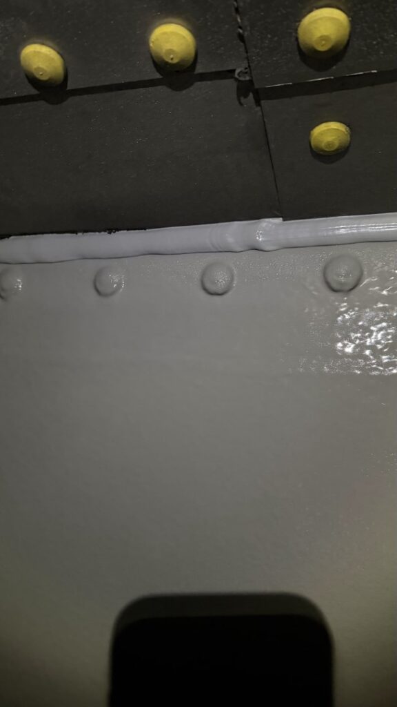 All termination points were then sealed using a chemical-resistant polyurethane sealant to ensure a fully encapsulated and durable finish.